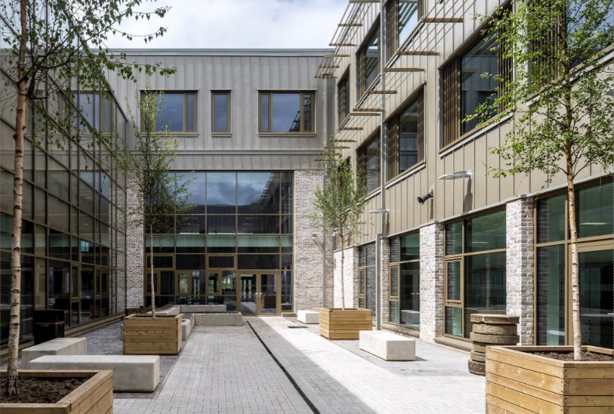 The courtyard with seating area for pupils and planting in Dunfermline Campus. 